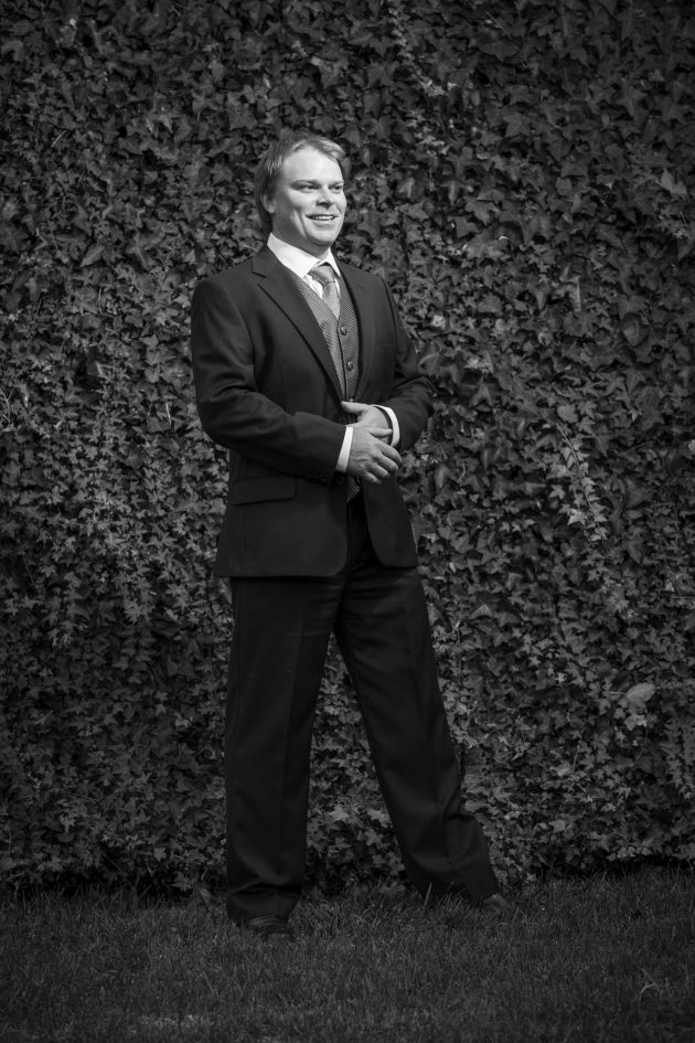 Groom in front of ivy wall, molenvliet venue - Cape Town Weddings