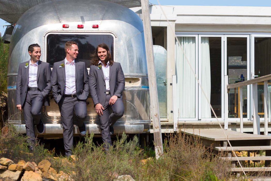 Groom and groomsmen in front of airstream - Cape Town Weddings